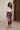 Flourish Emerald Silk Scarf, 135 × 135 cm, worn as a sarong in Lamu