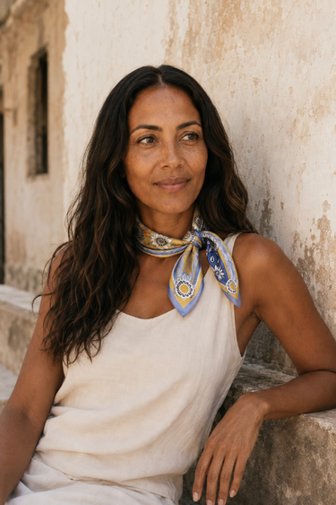Flourish Bronze Silk Scarf, 50 × 50 cm, worn as a neckerchief in Lamu