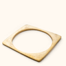 Ndani Smooth brass bangle on a light background.