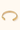 Wazi brass bangle on a light background.