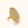 Olopa Smooth brass ring on a light background.