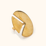 Robo Mwezi Smooth brass ring on a light background.