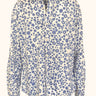 Tabasamu Limuru Shirt with a floral print, shown from the front.
